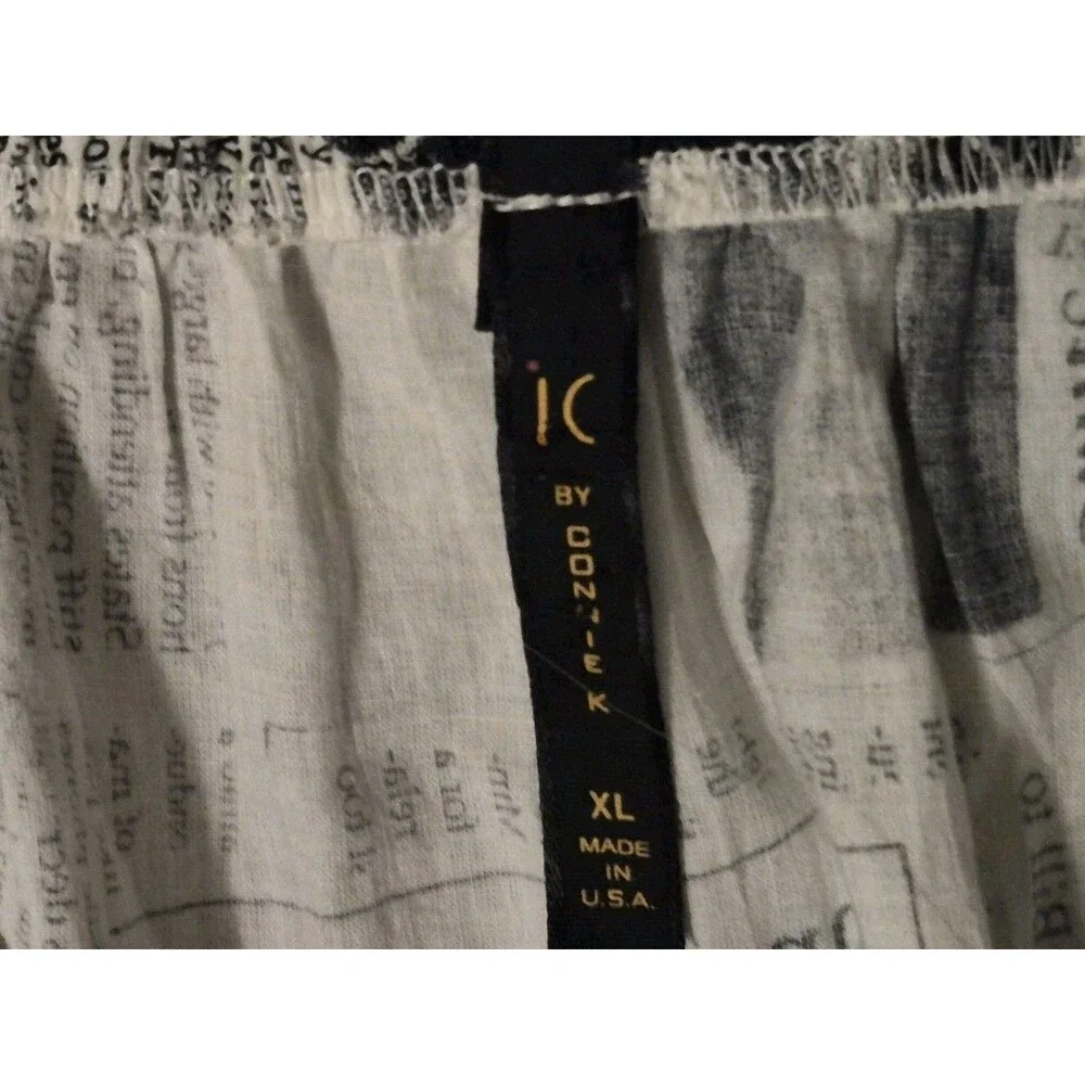IC By Connie Xl Newspaper Print Pleated Skirt Bows Asymmetrical Boho Urban Chic